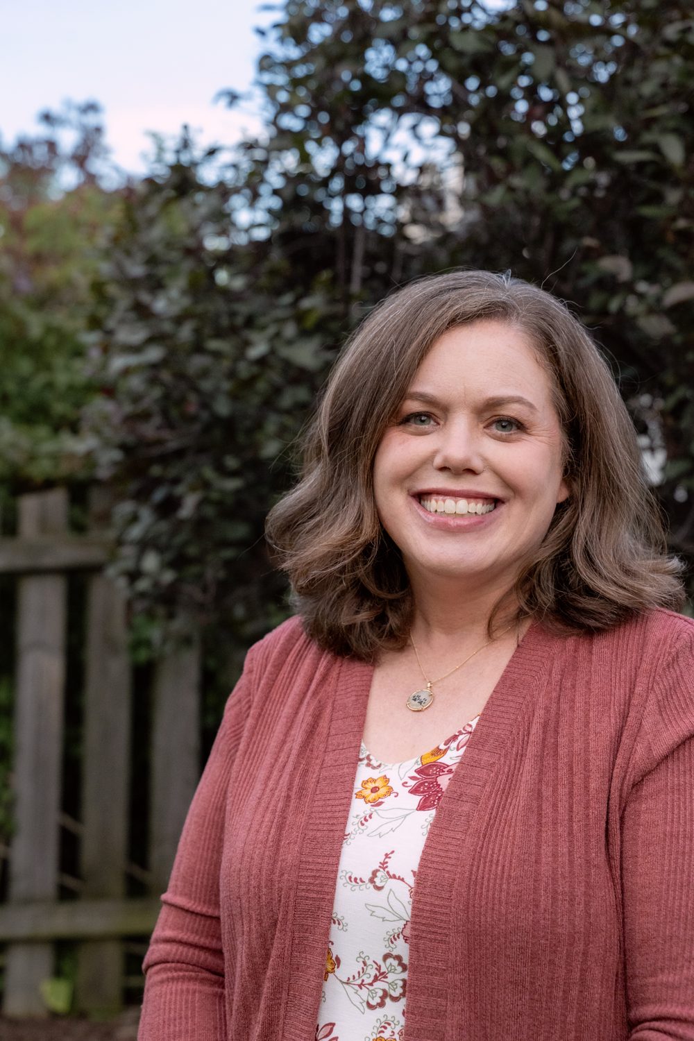 Portrait of Dr. Christie smiling outdoors